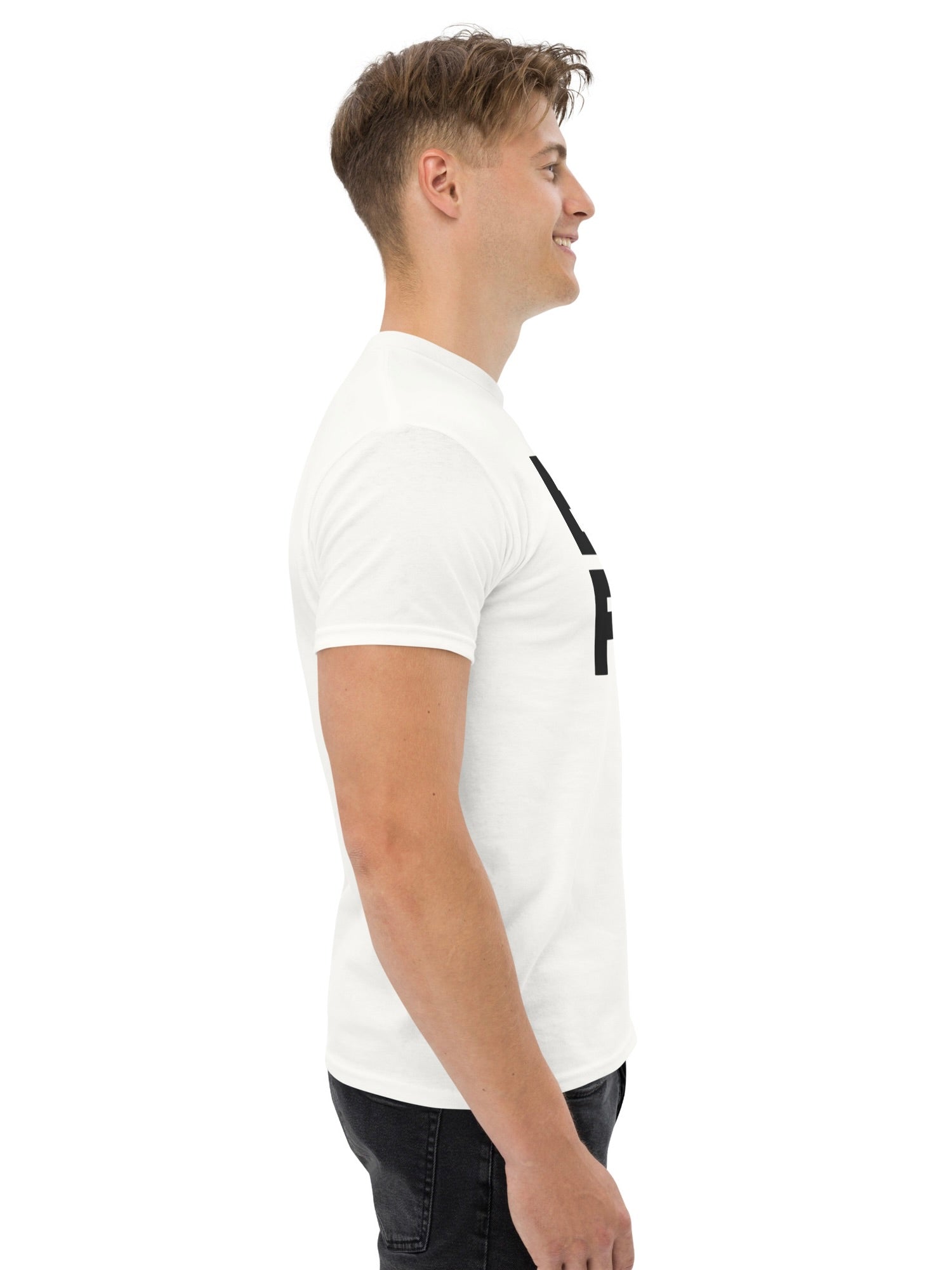 Man wearing a white polo shirt with black accents on a white background