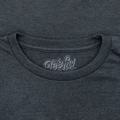 Close-up of a dark gray t-shirt with 'Tee Luv' logo on the neckline.