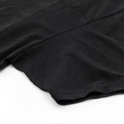 Close-up of a black fabric texture on a white background