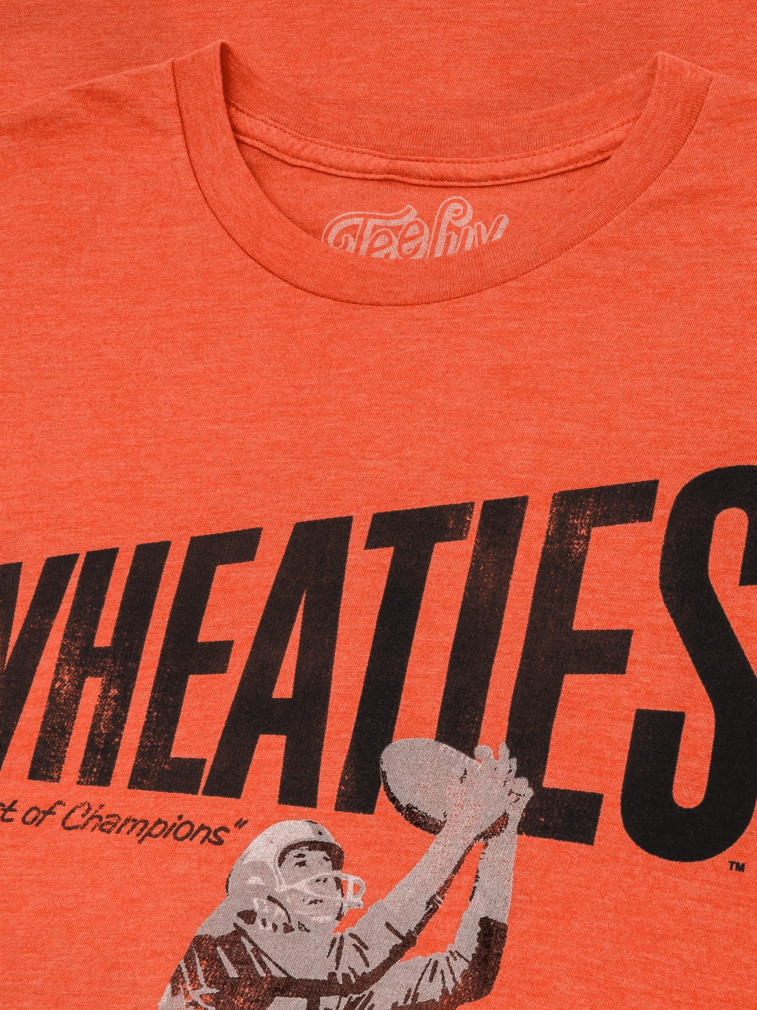 View of orange t-shirt with Wheaties logo