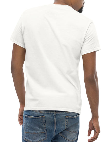 Man wearing a plain white t-shirt and blue jeans on a white background