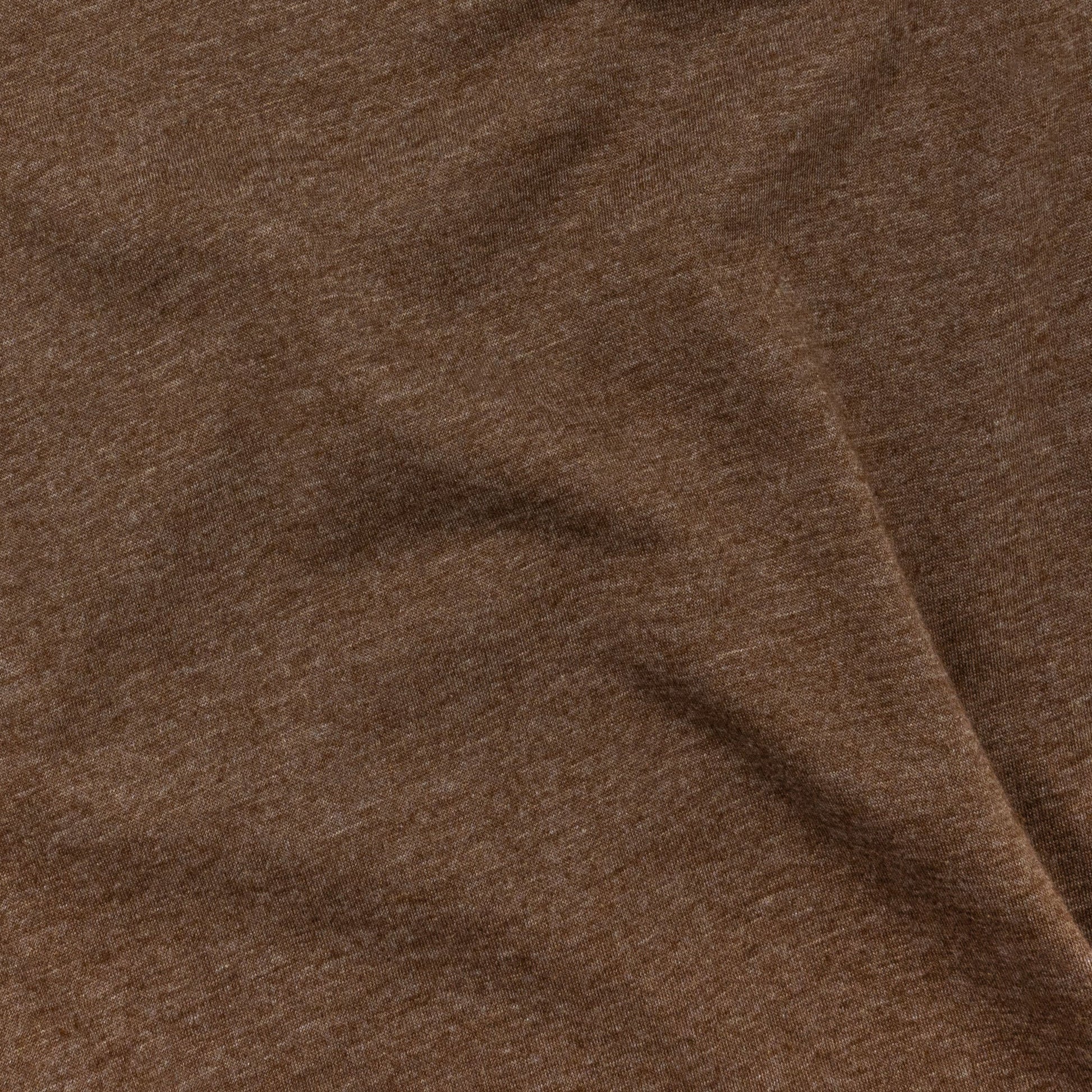 Close-up of brown fabric with visible texture