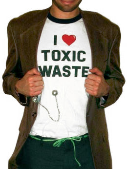 Costume guide for Chris Knight from the movie Real Genius. Chris wears a white t-shirt that says "I heart toxic waste," a brown corduroy jacket, a blue pair of pants with a green shoelace as a belt.