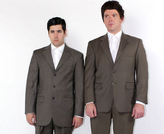 Costume guide for Raymond and Charlie Babbitt from the movie Rain Man.  Both Raymond and Charlie have dark hair, and wear white collared shirts and gray suits.