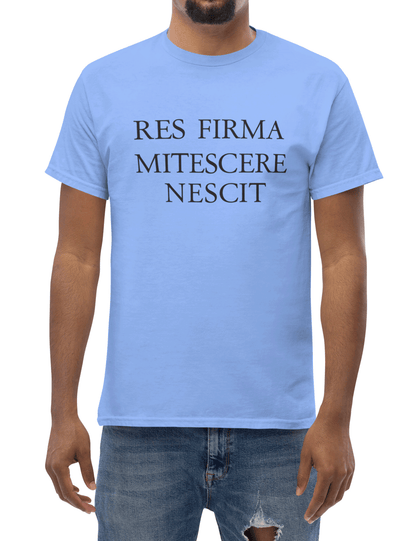 Person wearing a light blue t-shirt with Latin text on a white background