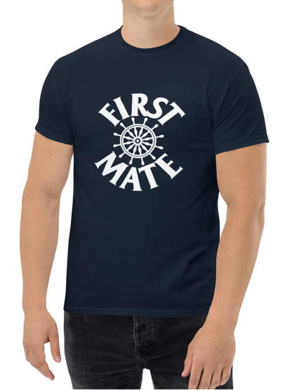 Man wearing a navy blue t-shirt with 'FIRST MATE' print on a white background
