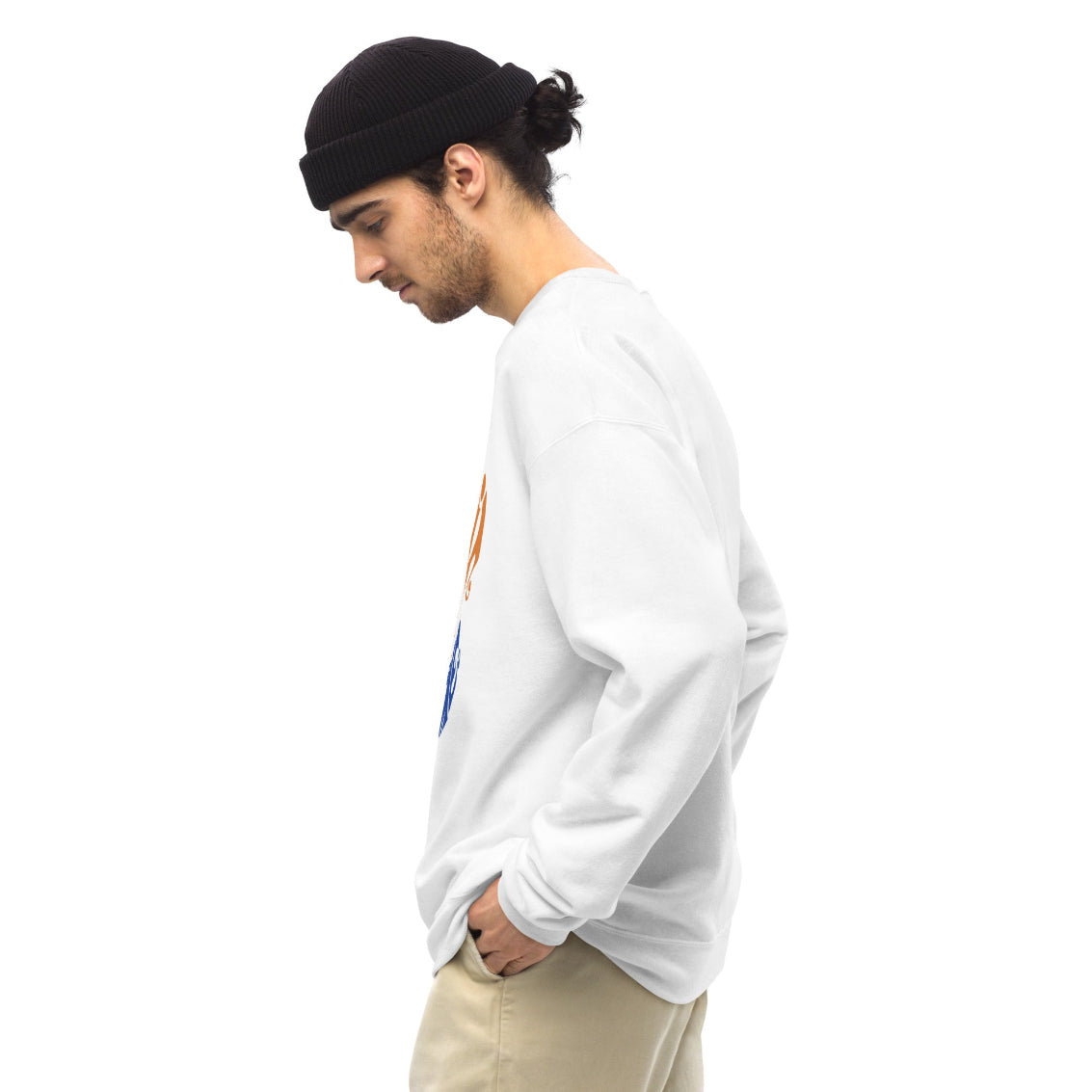Person wearing a white long-sleeve shirt with a colorful graphic on a white background